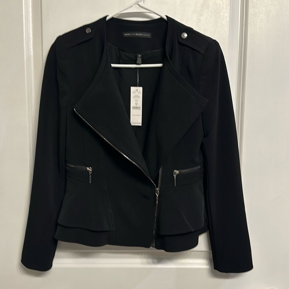 White House Black Market Woman’s Peplum Jacket. Black. Size XS.